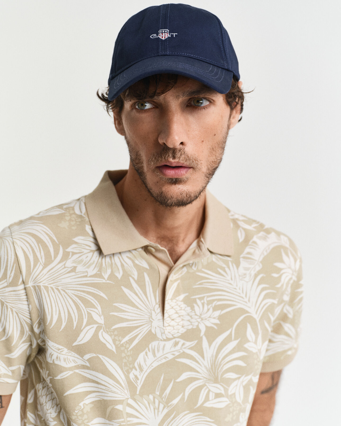 Poloshirt met tropische print