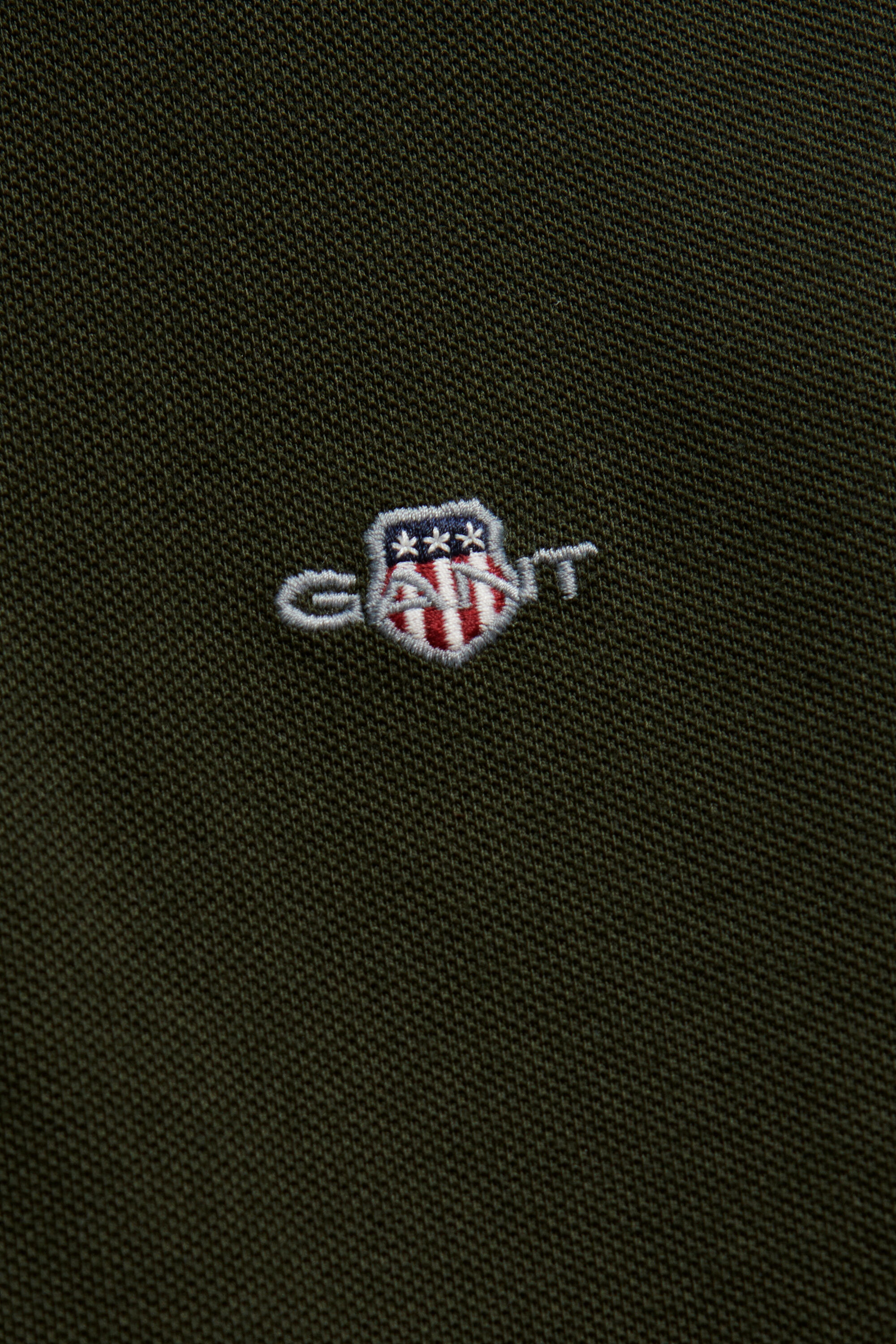 Poloshirt met schild voor tieners
