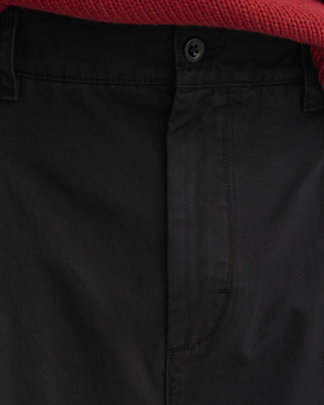 Volume chino met plooien