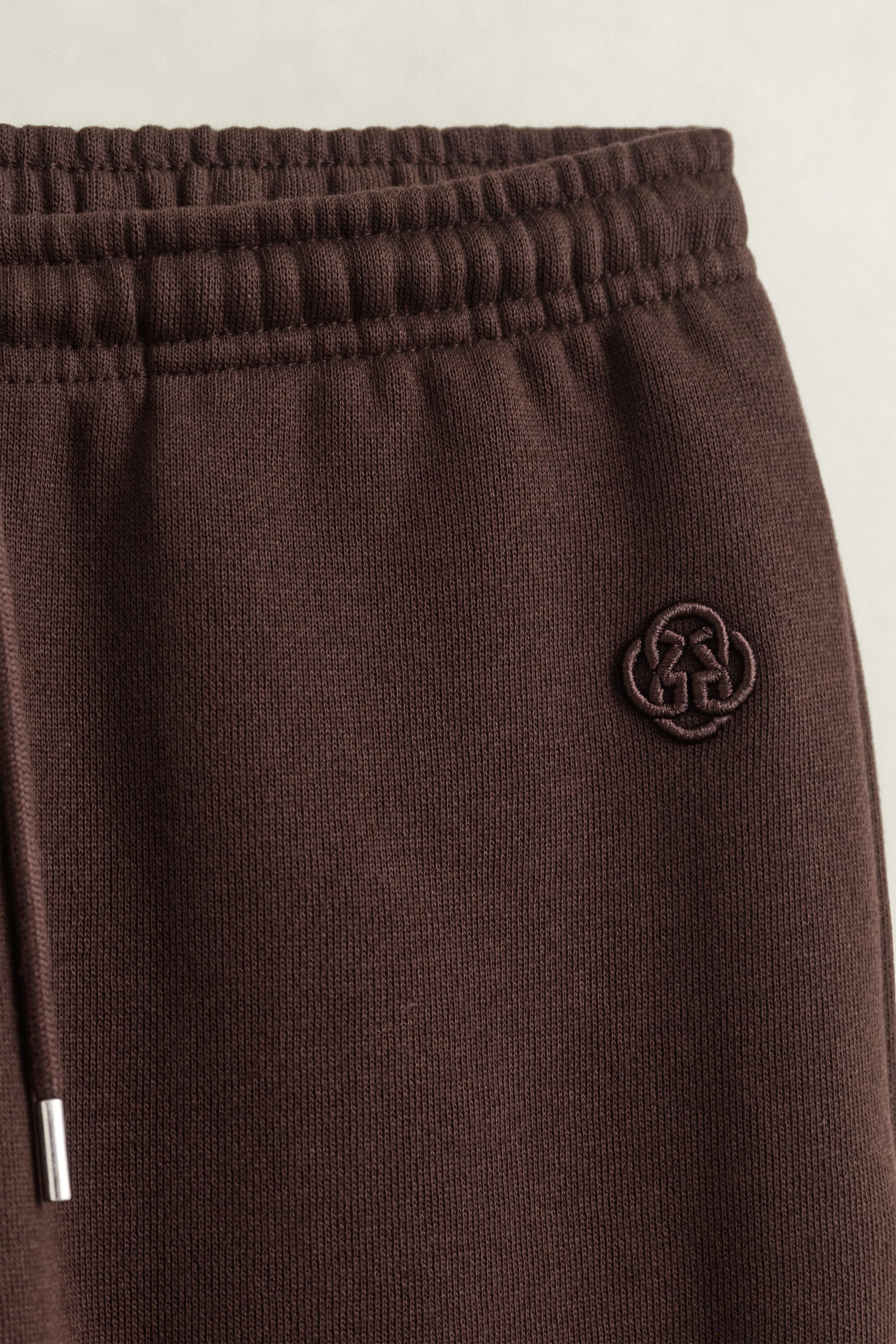 Joggingbroek met bedeltje